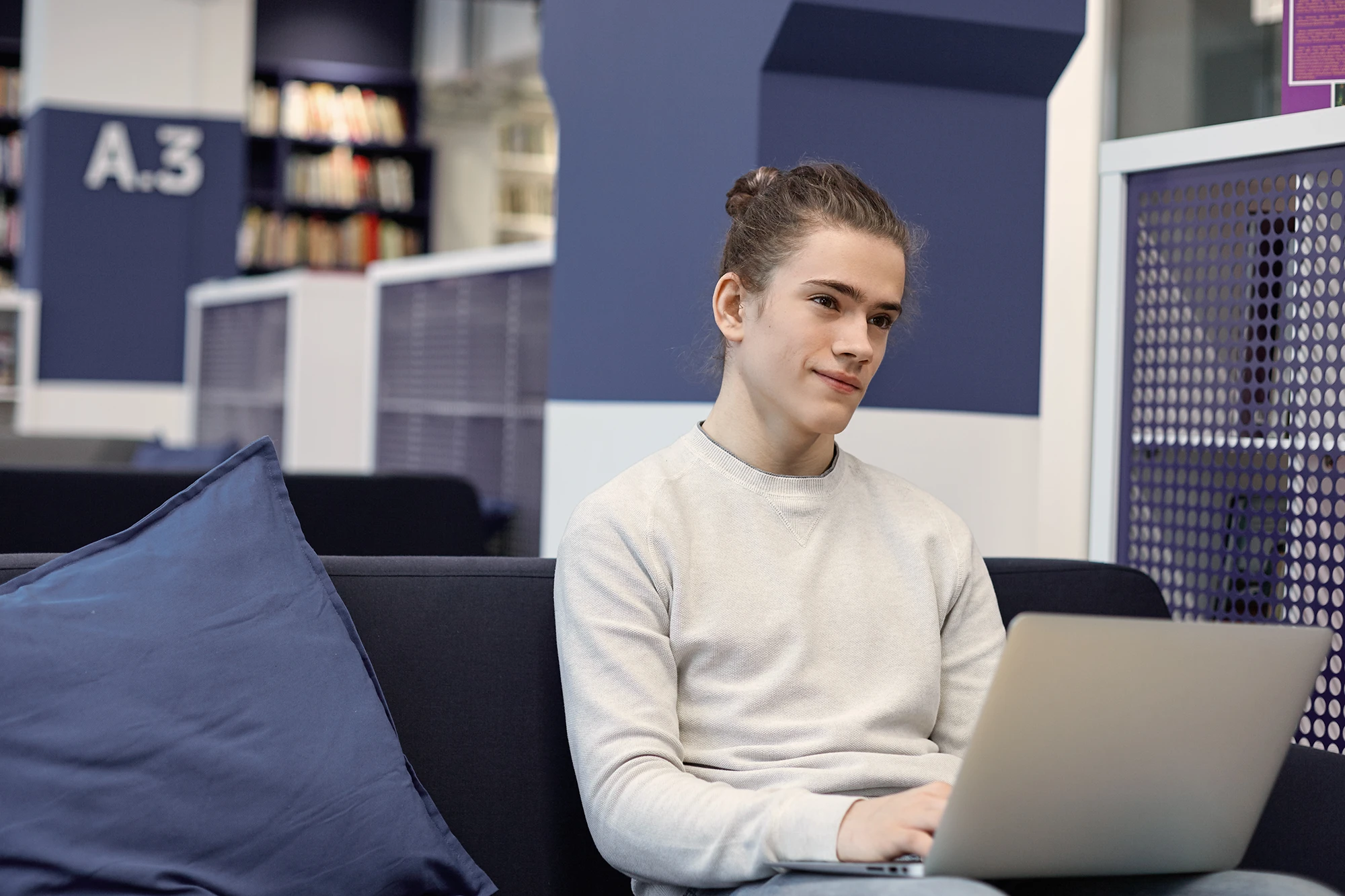 English Student studying on laptop