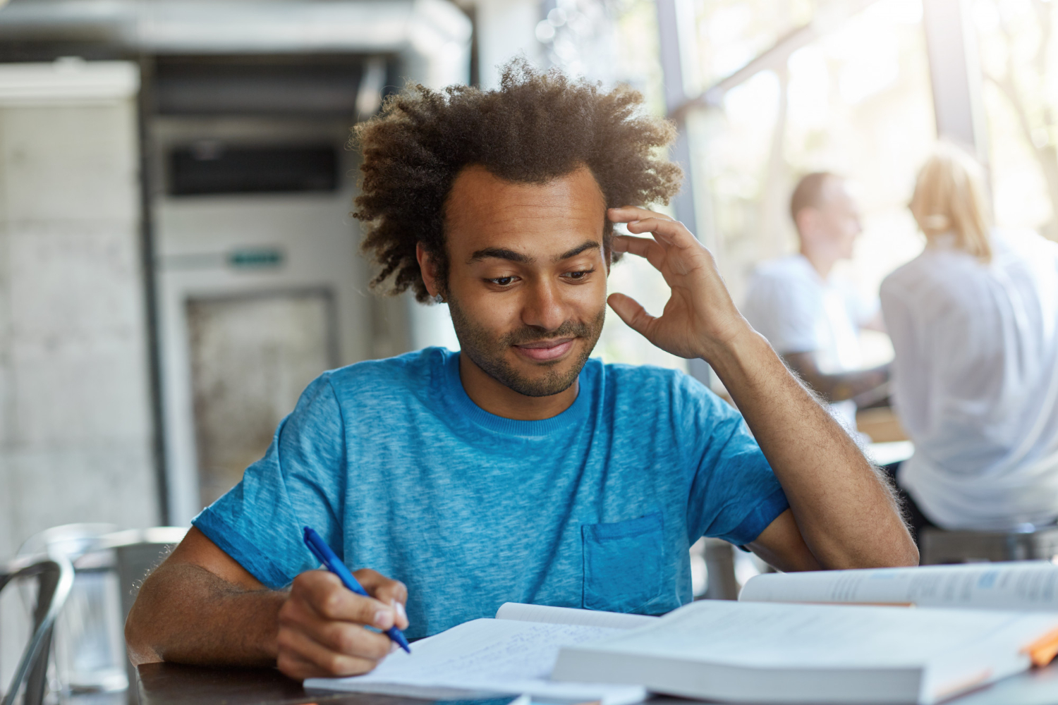 male student studying